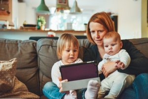 mother with kids in the living room